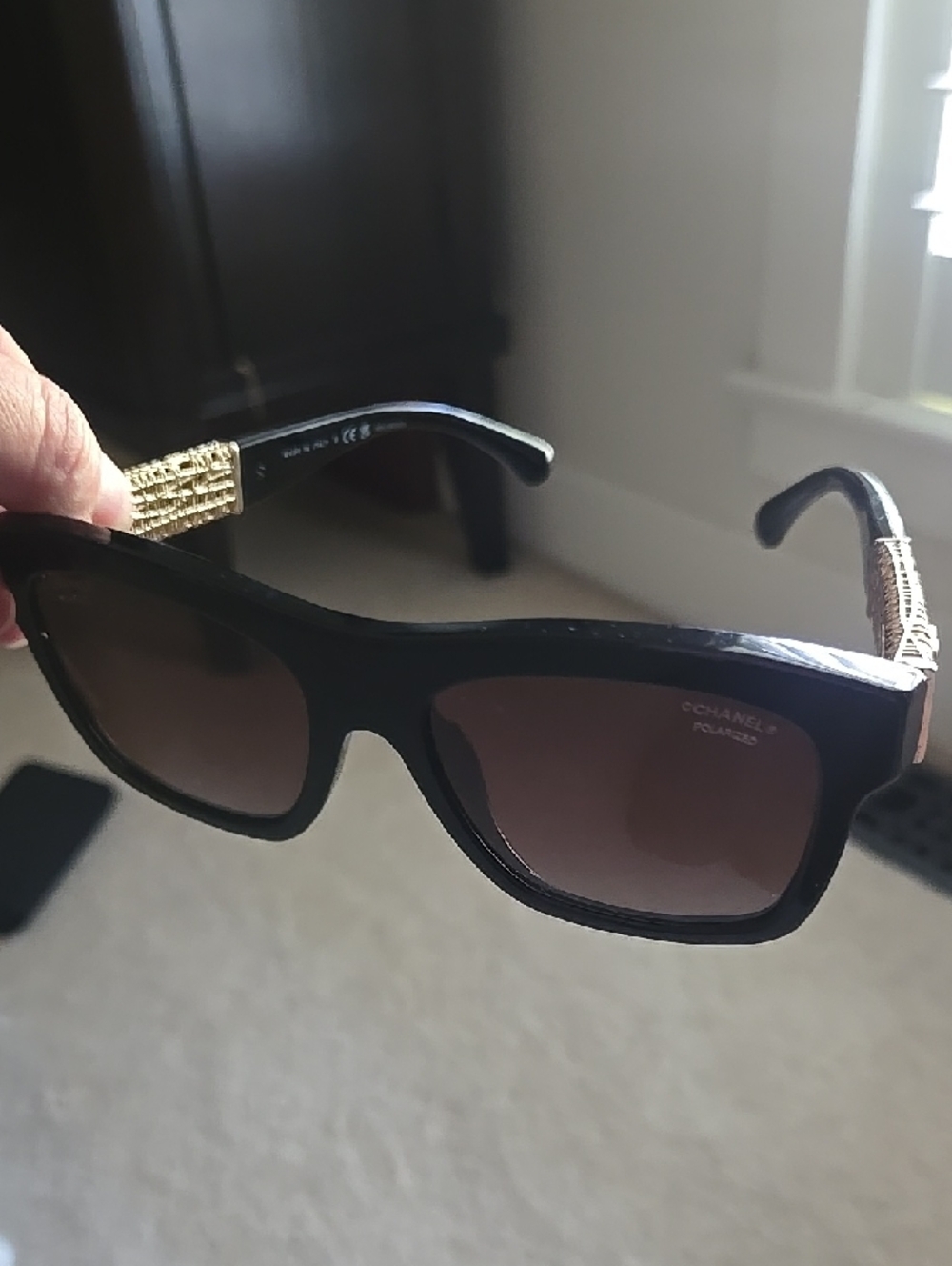 CHANEL Black Sunglasses with Gold Temple Accents